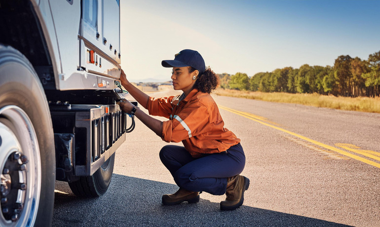 Top Safety Practices in Freight Delivery by Rom Trans 2 diver performing truck inspection